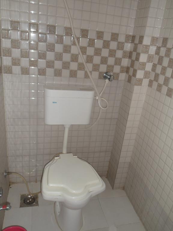 Hotel Madhusudan Dwārka Camera foto