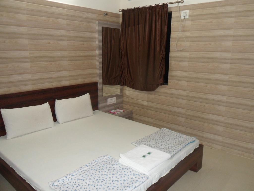 Hotel Madhusudan Dwārka Camera foto